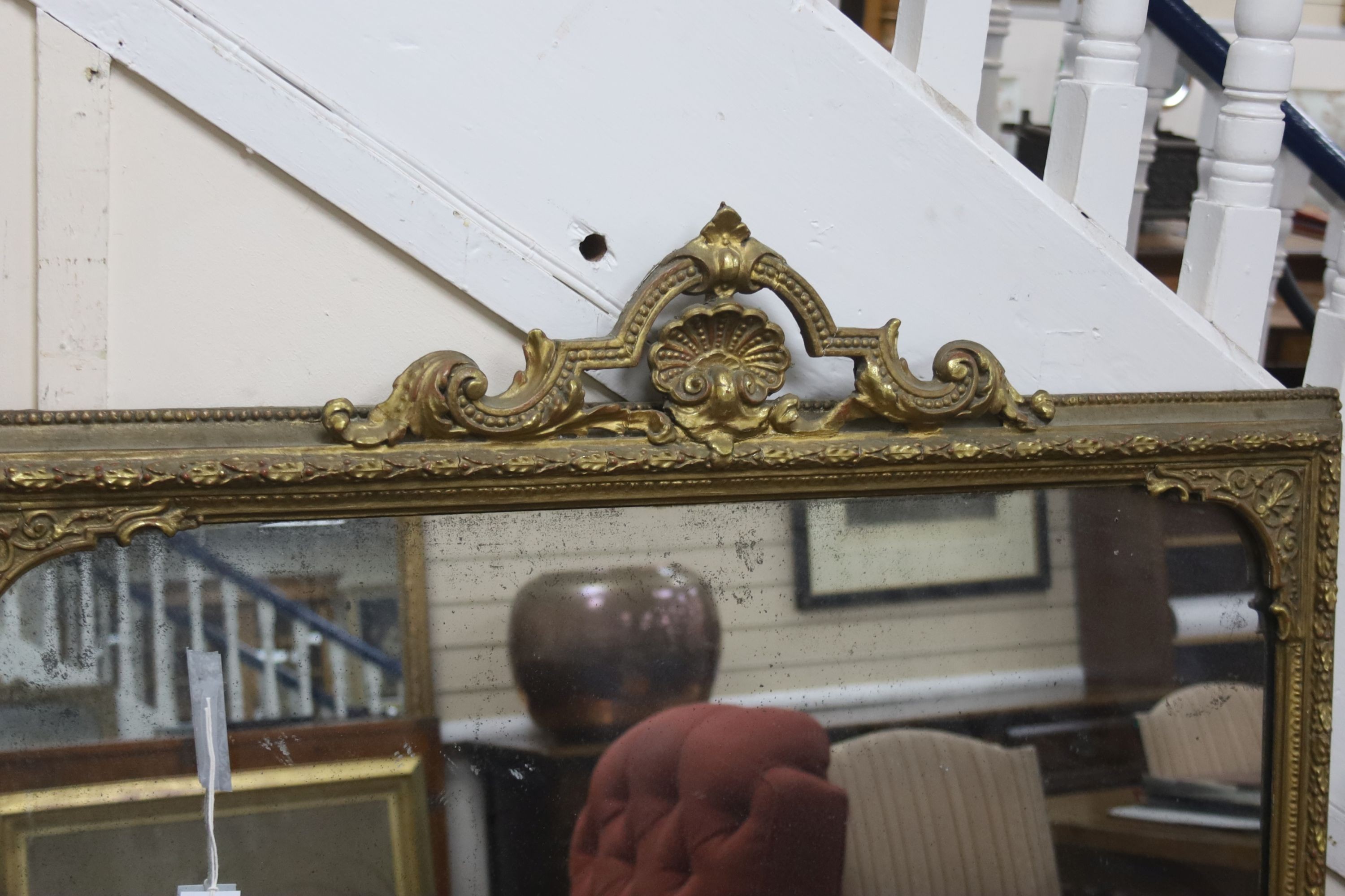 A Victorian rectangular giltwood and gesso overmantel mirror, width 106cm, height 140cm